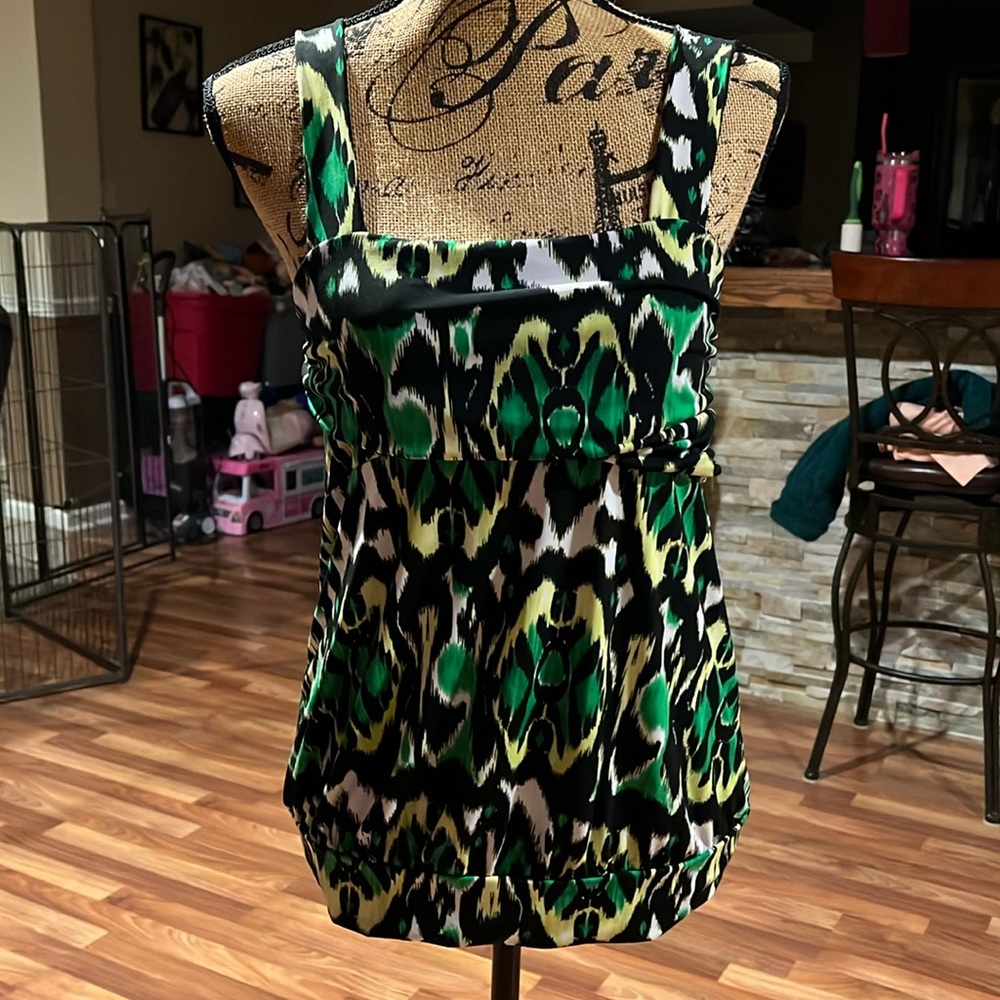 Size medium top with green yellow white and black